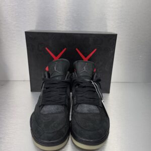 KAWS x Air Jordan 4 Retro 'Black' – front view