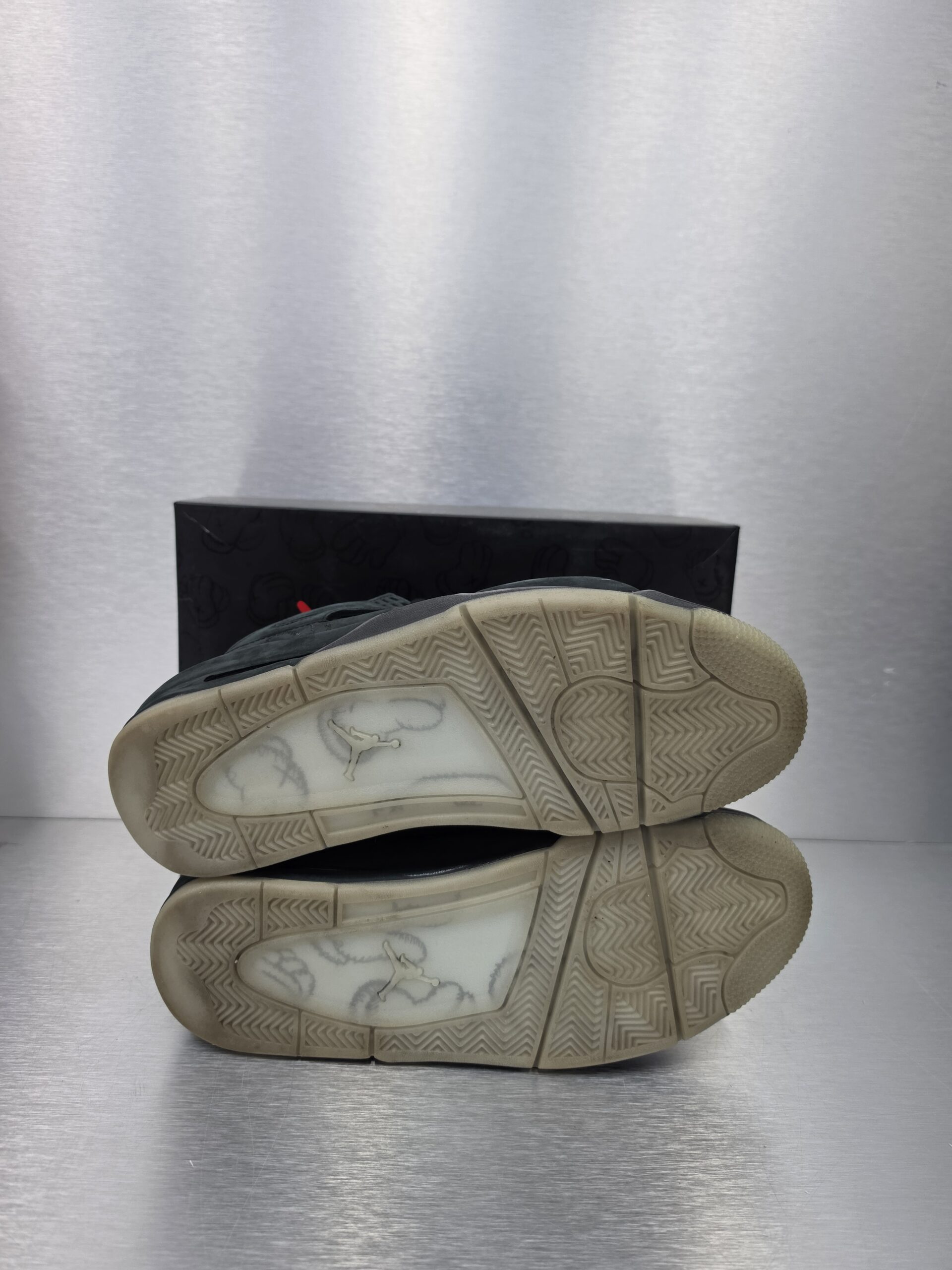 KAWS x Air Jordan 4 Retro 'Black' – sole view